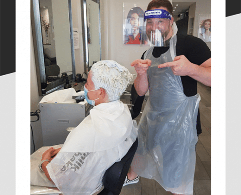 Richard lightening his clients hair