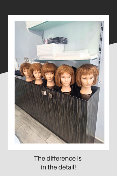Row of five mannequin heads with different hair cuts