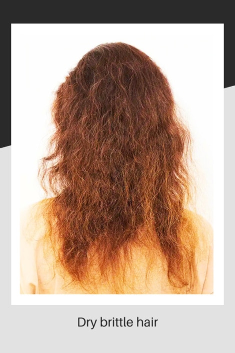 Woman with long, dry brittle red hair.