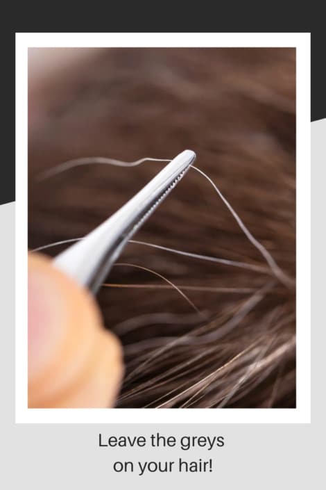 Tweezers pulling grey hair from head