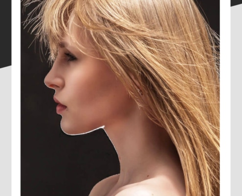 Model with wispy hair that is blowing everywhere